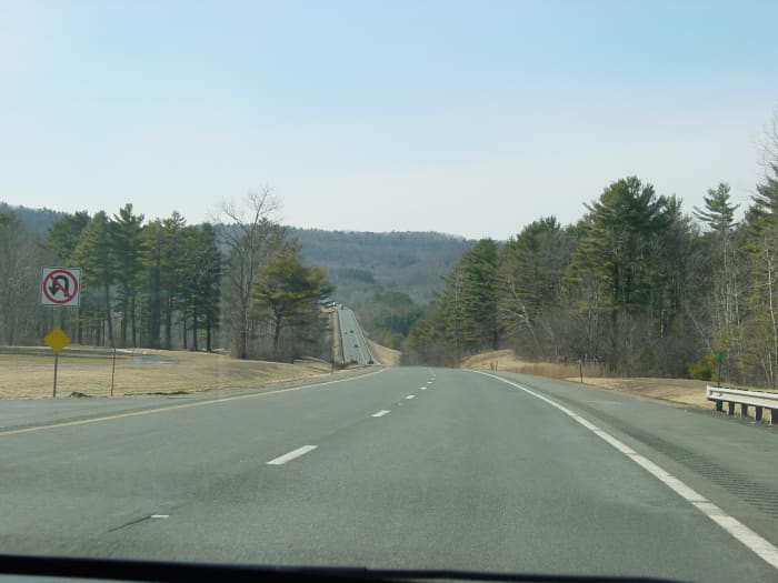 Everyone copes differently before a funeral. Don't feel bad for enjoying the ride and company of others in the car.