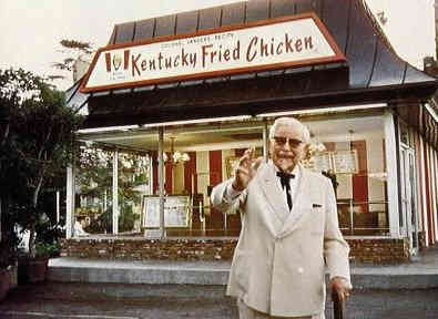 Colonel Sanders outside Kentucky Fried Chicken restaurant