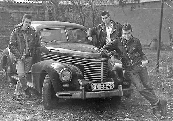 These are "Greasers." "Wendall," was not a part of these guys, but he knew his '57 Chevy like a book.