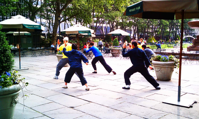 Dance or any of Bryant Park's other activities like morning Tai Chi are great free things to do in NYC while on summer vacation