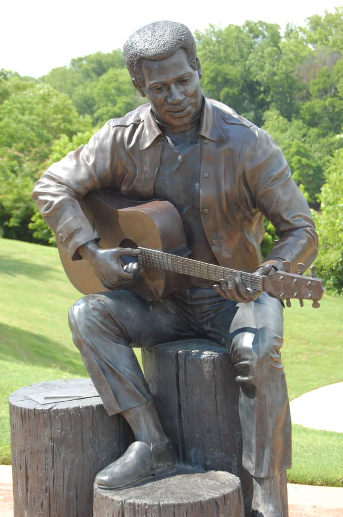 Statue entitled "Otis Redding Sittin on the Dock of the Bay" in Gateway Park, Macon Georgia. Statue by Bradley Cooley and Bradley Cooley, Jr, of Bronze by Cooley.