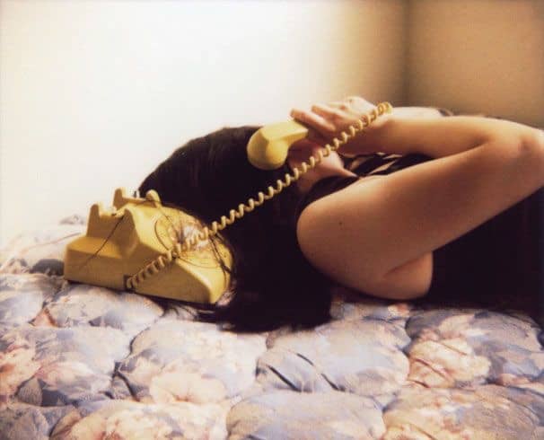 Making a quick phone call is a great way to make a human connection if you're feeling lonely on a sick day.