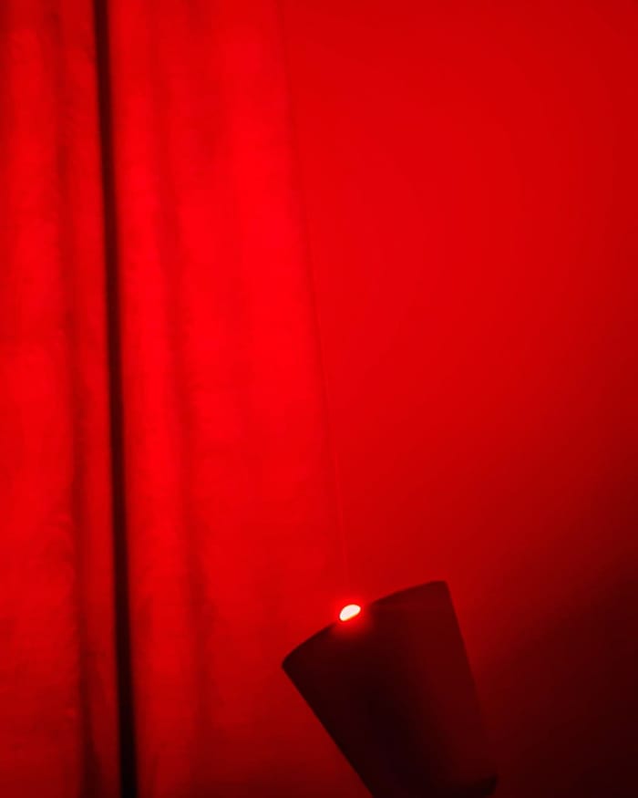 This is the red light that I use in my room, which boosts the production of melatonin in my body and aids me in falling asleep.