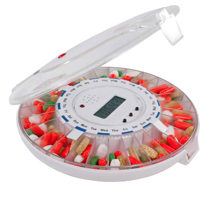 Automatic pill dispenser with alarm and compartments for every day of the week, bracketed off by morning, noon, evening, and bedtime