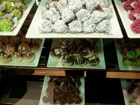 Date fruit covered in coconuts, chocolates, nuts and other toppings are very popular as gifts