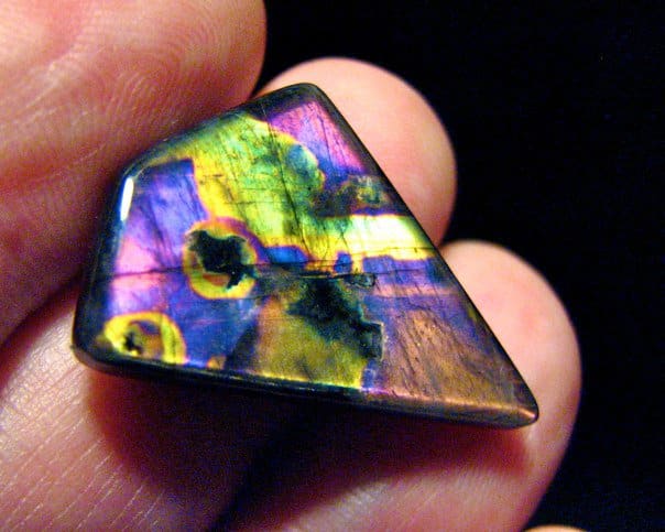 Polished spectrolite showing all the colors of the color spectrum.