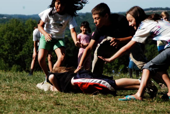 Playing closely can spread Head Lice because of the head-to-head contact.