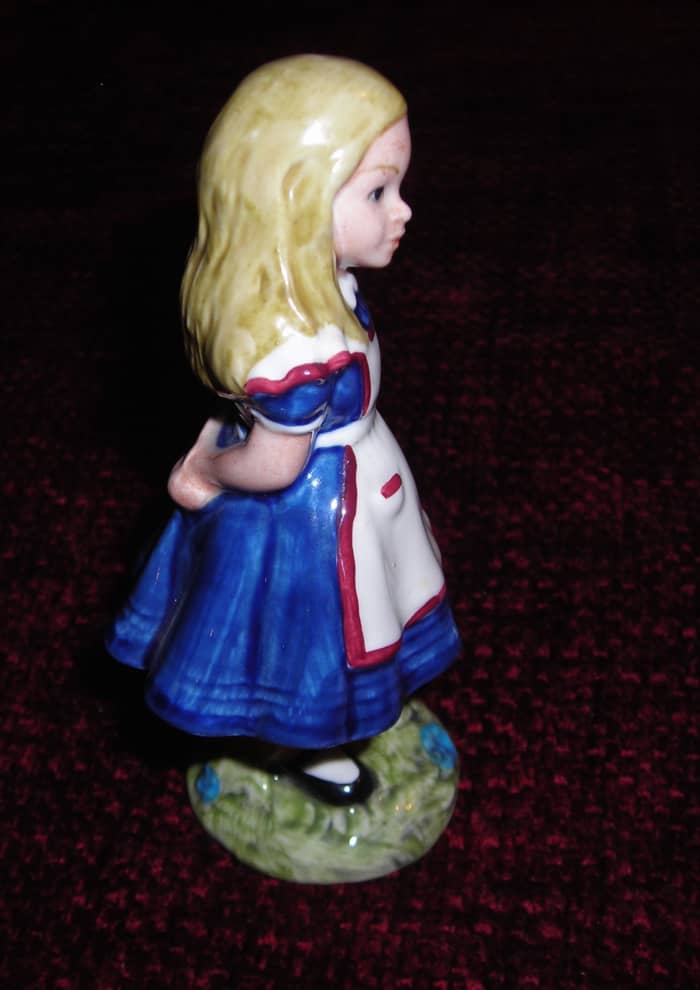 Beswick/Royal Doulton figurine of Alice in Wonderland, style one, Royal Doulton under license from Beswick