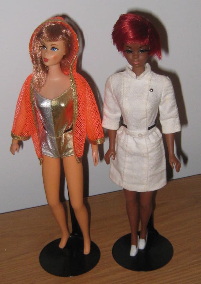 Living Barbie and Julia, whose aging black hair has oxidized to its beautiful crimson color.