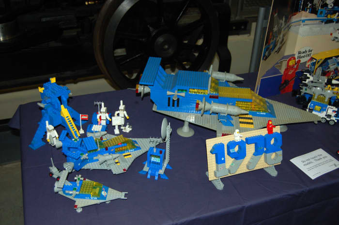 The moon landing set on the left is circa 1975, and is an extremely early example of the Lego Space series.