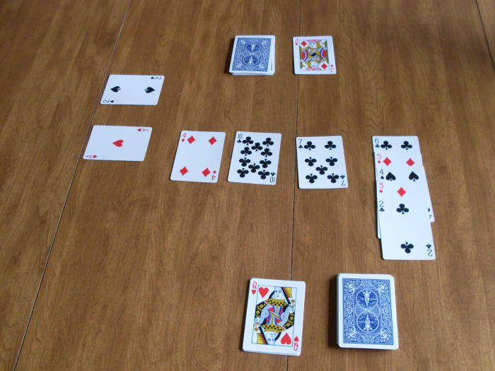 This is what your cards will look like once the play has been going on for awhile. Notice there are aces being built on in the left hand side.