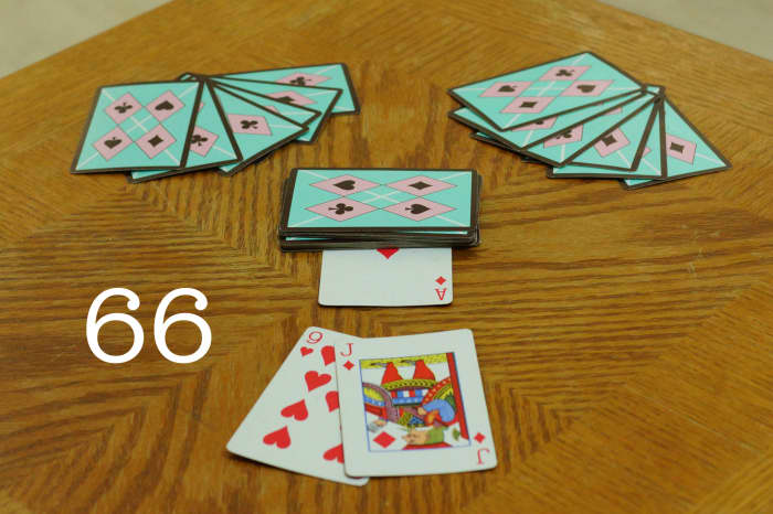 This is the setup to 66 with a possible trick in front. In this example trick, the Jack would beat the 9 of hearts because it is a trump card.