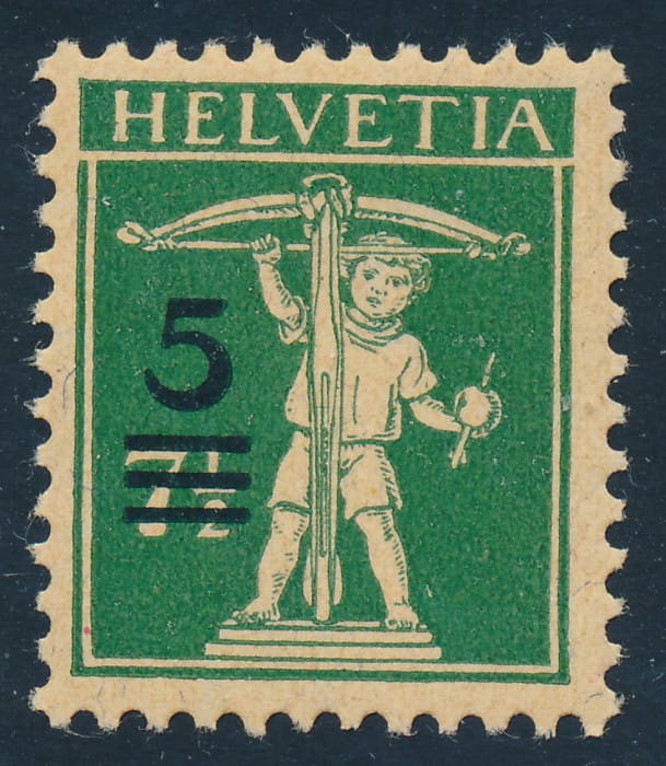 An older stamp from Switzerland, showing the "low tech" way changes in postal rates were sometimes handled