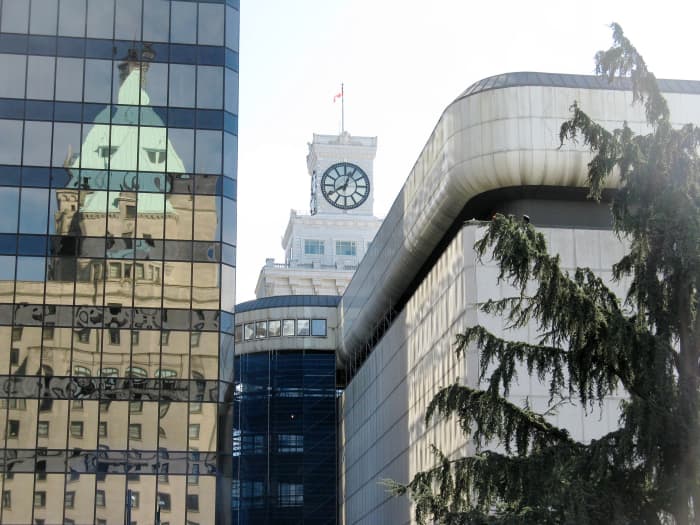 Photos can stimulate the imagination, especially when there is something unusual about them. The reflection in this photo shows the Hotel Vancouver in downtown Vancouver, British Columbia.