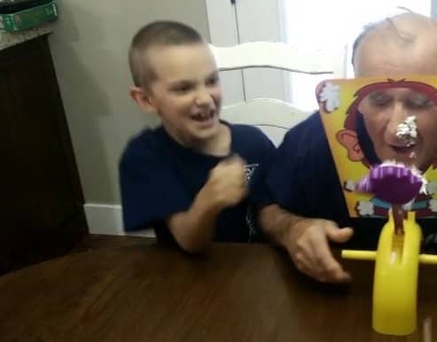 This isn't the best picture in the world but here's a look at my Dad getting hit with the whipped cream while my son laughs hysterically. Pie Face is always good for a laugh.