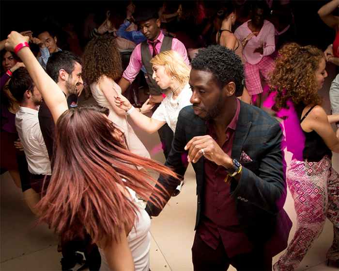 Some men like wearing jackets or sport coats to salsa clubs, but it's not necessary