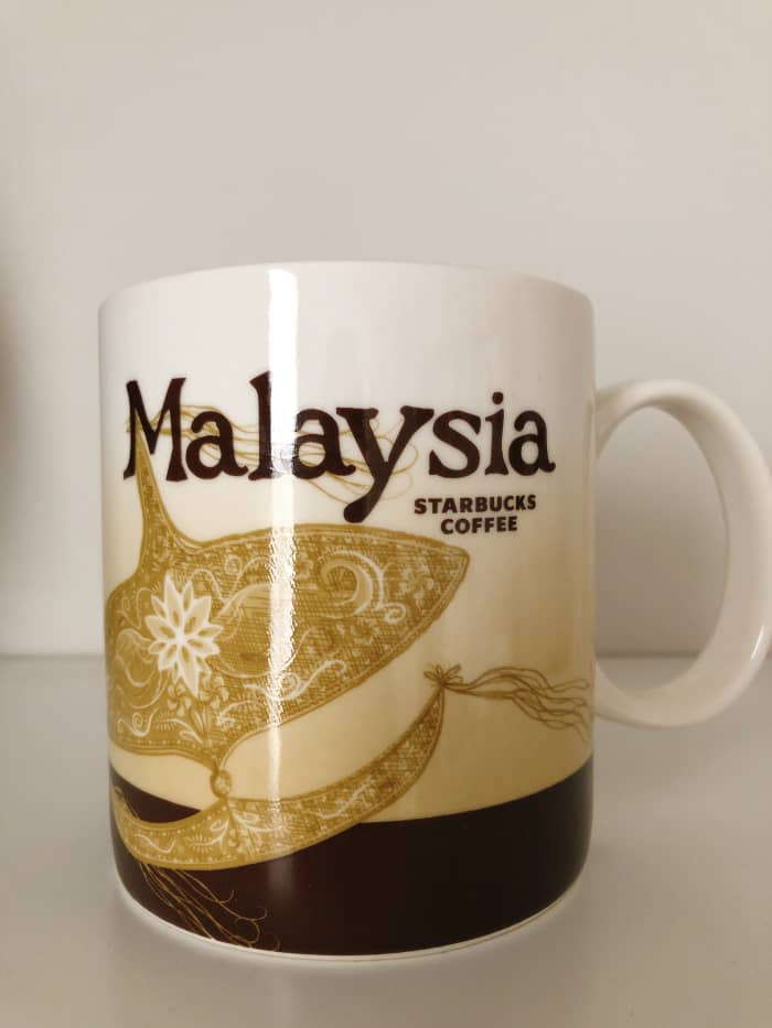 My home country! Multi-ethnic and multi-racial country. The display on the mug is a traditional Malaysian kite called "Wau Bulan."