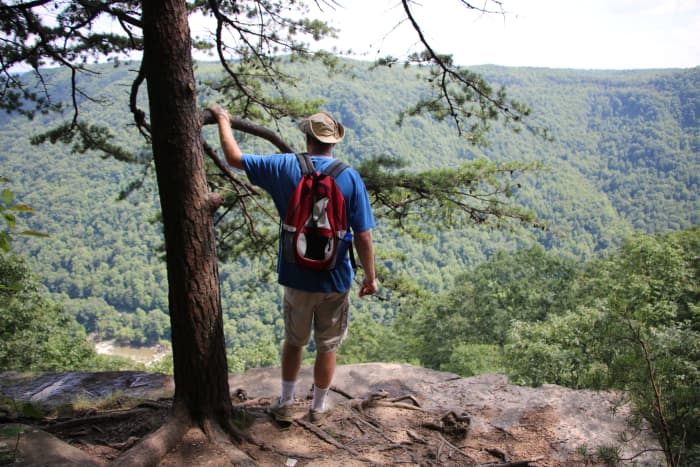 The Endless Wall Trail offers incredible views of the New River and passing white-water rafters.