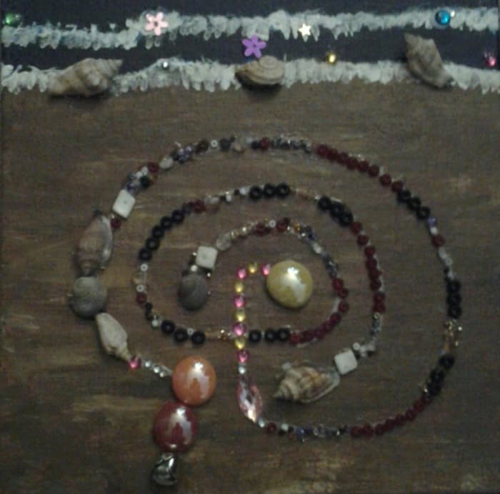 Seafarer Mama's tabletop seashore labyrinth, which she walks when the wooded labyrinth is covered with snow and ice.