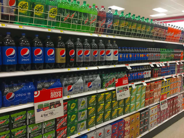 Soda in particular contains an excessive amount of the potentially dangerous artificial sweetener, high fructose corn syrup.