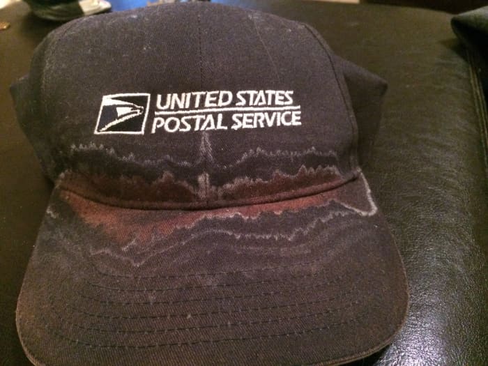 The U.S. Postal Service doesn't provide its temporary workers with uniforms, but it does give them a hat. This hat was encrusted with sweat after a couple of weeks working in the summer heat.