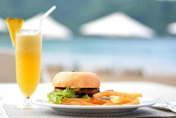 An early dinner or a filling late lunch can be less expensive than a restaurant meal during the dinner rush hour.