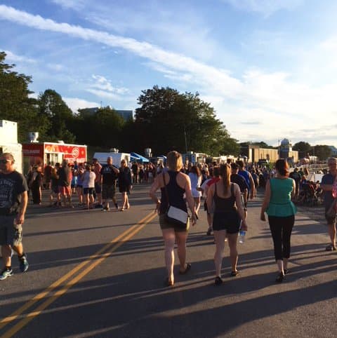 Crowds gathered lakeside the night before the Royal St. John's Regatta, 2018. Going to the lake the evening before, to socialize and enjoy the offerings of the many food vendors, has become almost as much a part of the Regatta tradition as race day.