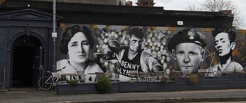 Johnny Ramensky is shown on a mural (second from right) outside a Scottish pub.