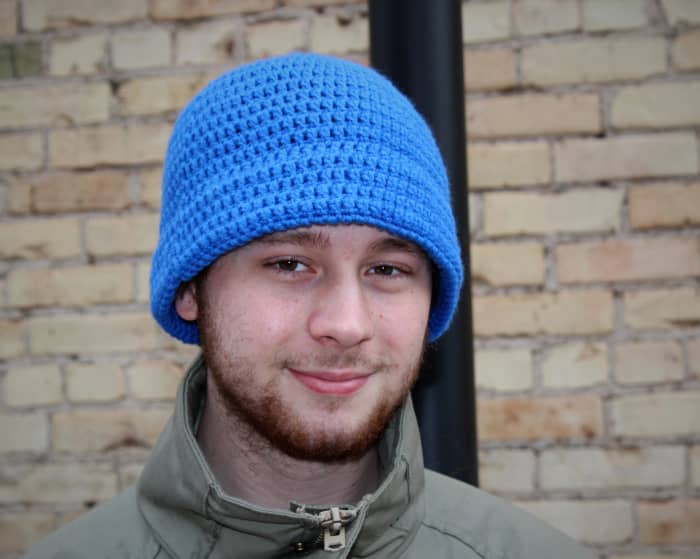 Even beginners can crochet this warm hat! It's made with a larger hook so the stitches are nice and chunky.