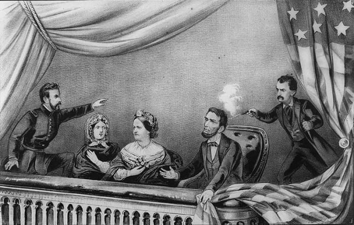 Lithograph of the Assassination of Abraham Lincoln. From left to right: Henry Rathbone, Clara Harris, Mary Todd Lincoln, Abraham Lincoln, and John Wilkes Booth. Rathbone is depicted as spotting Booth before he shot Lincoln and trying to stop him as B