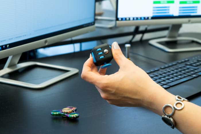 The fidget cube being used in an office. Small and discreet. I would have shown you mine, but I lost it somewhere.