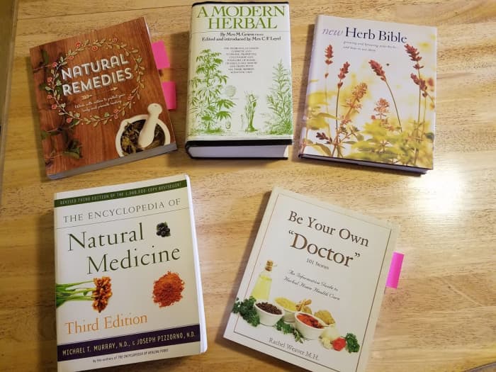 I referenced a number of books while attempting to create a salve to help my daughter. A few are pictured above.