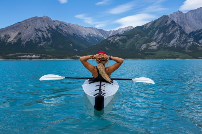 You don't need a tropical island or a canoe but the same idea counts. Do something that's fun and physical enough to give yourself a natural lift.