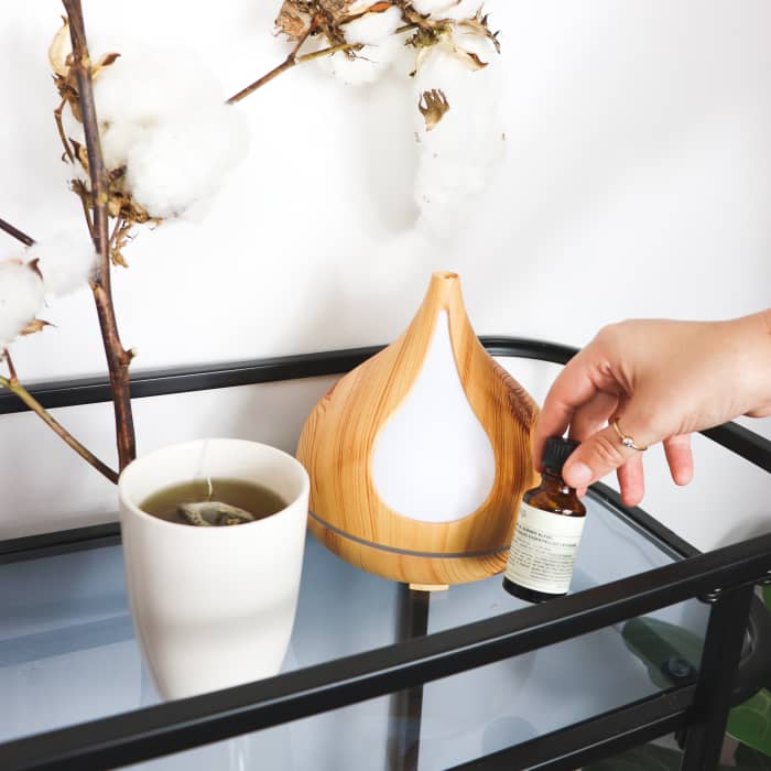 Diffuse oils into the air if you're helping young children rather than applying the oils topically.