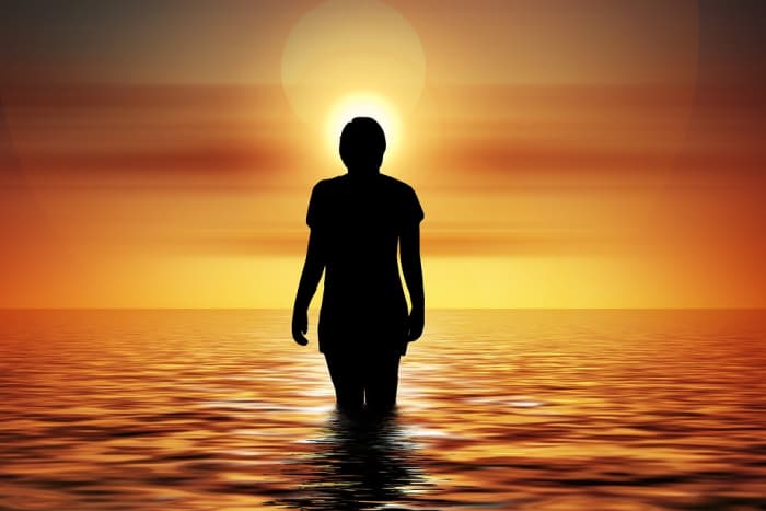 Prot travels by a beam of light. He believes in the interconnectedness of all beings and nature.