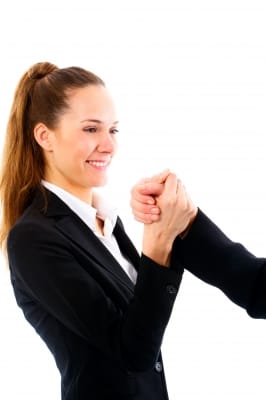 When shaking or holding hands with a dementia patient, use the grip shown above: a thumb-to-thumb grip instead of palm-to-palm. Dementia patients will often squeeze or grip hard due to agitation, and the above grip avoids injury.
