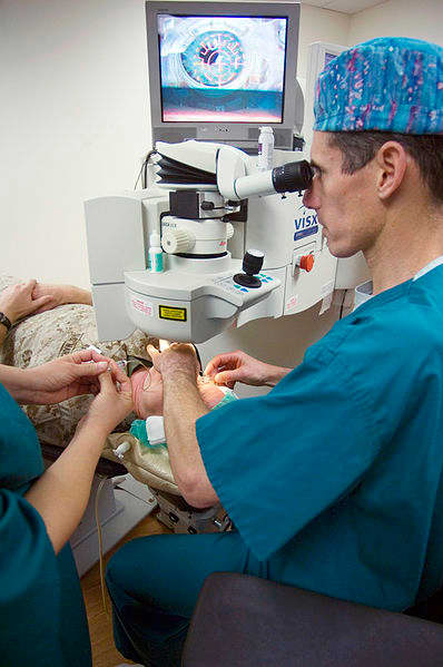 A doctor performing LASIK.