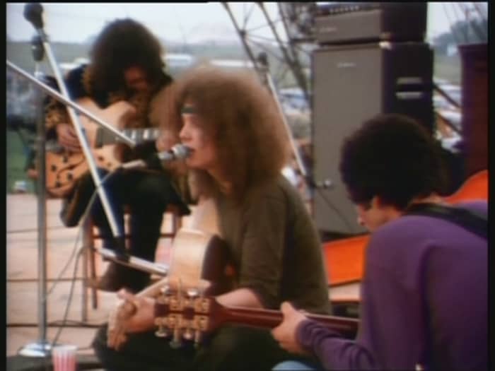 Bert and his backing musicians onstage at Woodstock
