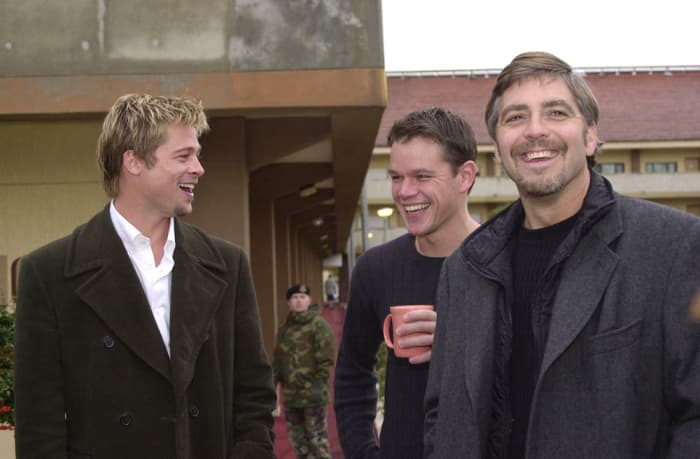 Clooney, Pitt, and Damon ham it up for the camera.
