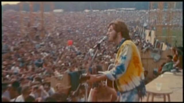 John Sebastian entertaining the crowd at Woodstock