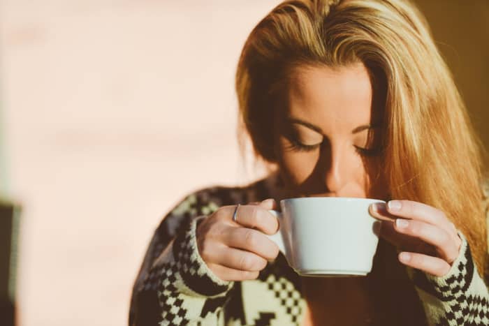 This is NOT me in disguise. But notice what this model is doing:enjoying black coffee, MY favorite taste.