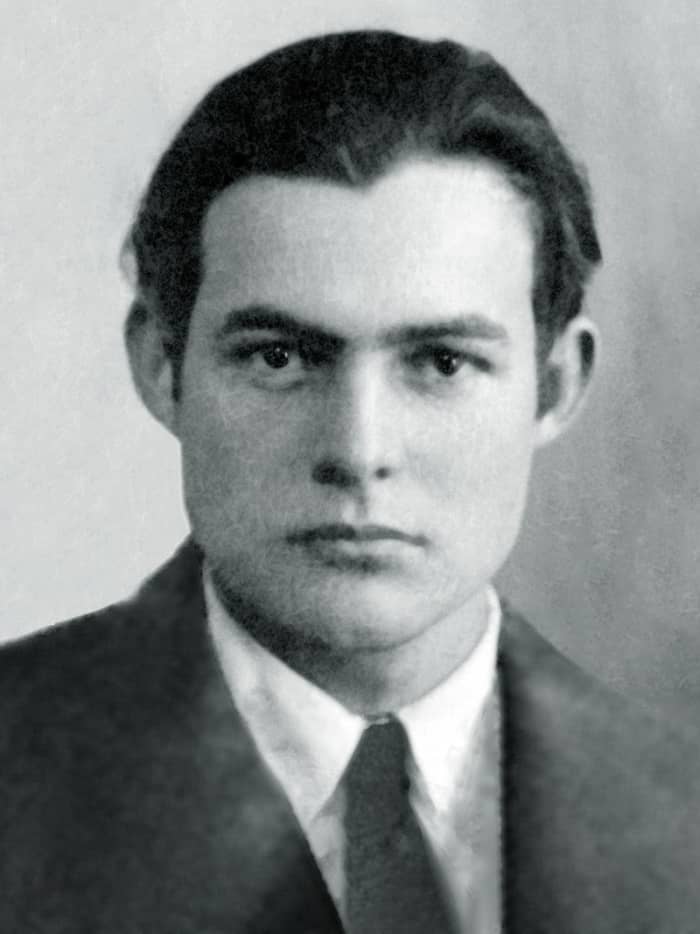 The passport photo of a young Ernest Hemingway, taken when he was married to Hadley and living in Paris.