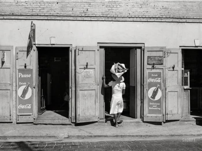 December 1941. "Charlotte Amalie, Saint Thomas, Virgin Islands. Along the main street." Medium format negative by Jack Delano.