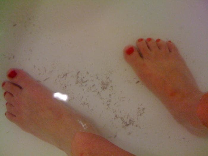 This is just some of the dead skin rolls from body exfoliation that were left on the bottom of my bathtub.