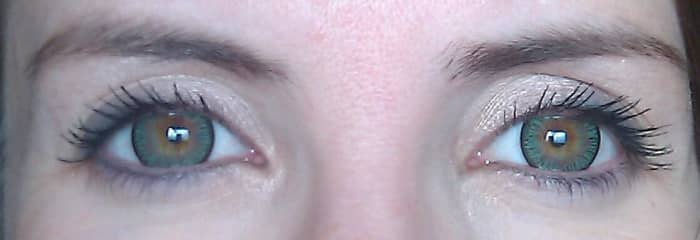 The black ring around the outside, called a limbal ring, makes irises look bigger and whites look whiter.