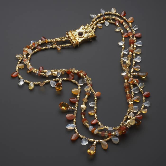 A three-strand necklace.