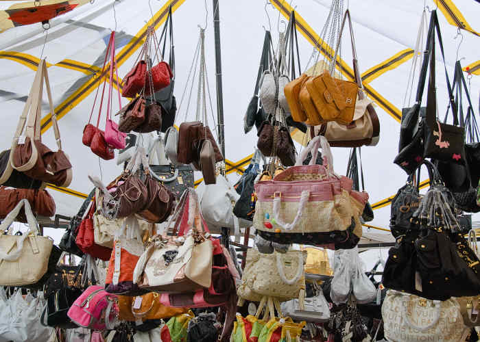 fake designer handbags are readily available in markets such as this in Turkey.