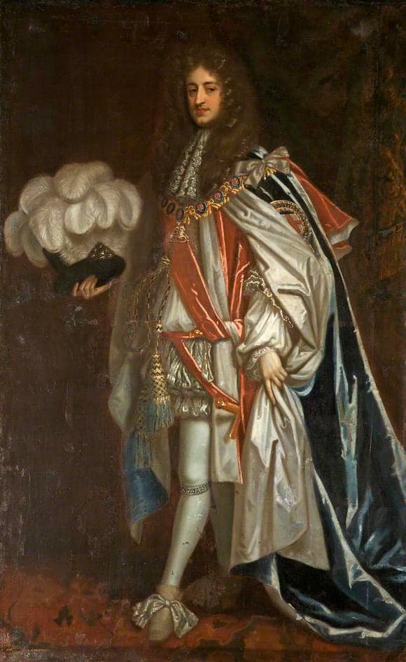 Man in Wig Holding Hat