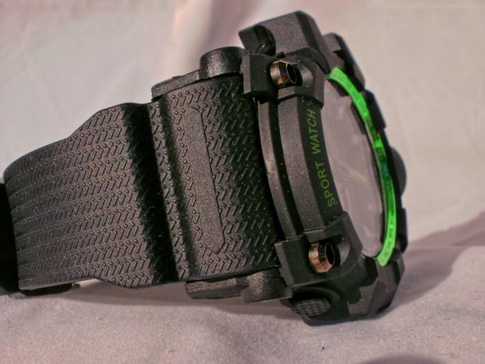 From this angle, you can see the fluorescent green metal band surrounding the dial.