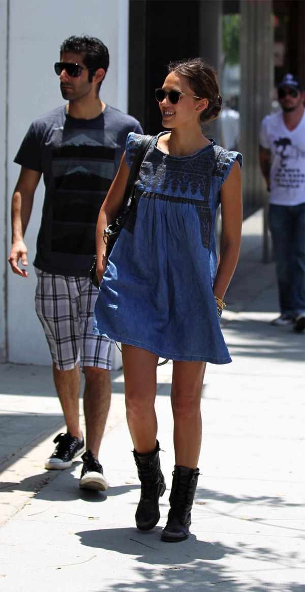 Jessica Alba wearing an Isabel Marant denim dress paired with chunkier boots.
